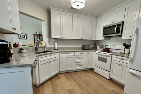 Kitchen Remodel. Subway tile Backsplash & White cabinets 